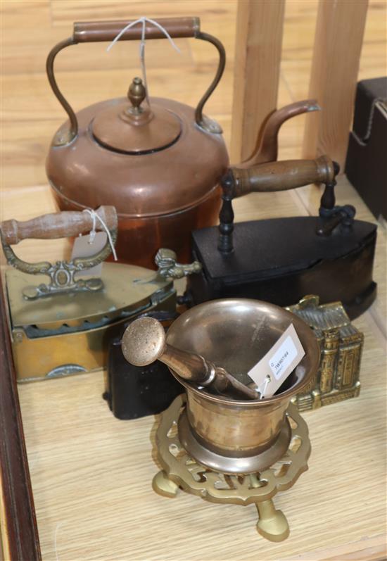 A copper kettle, two flat irons and sundry metalware